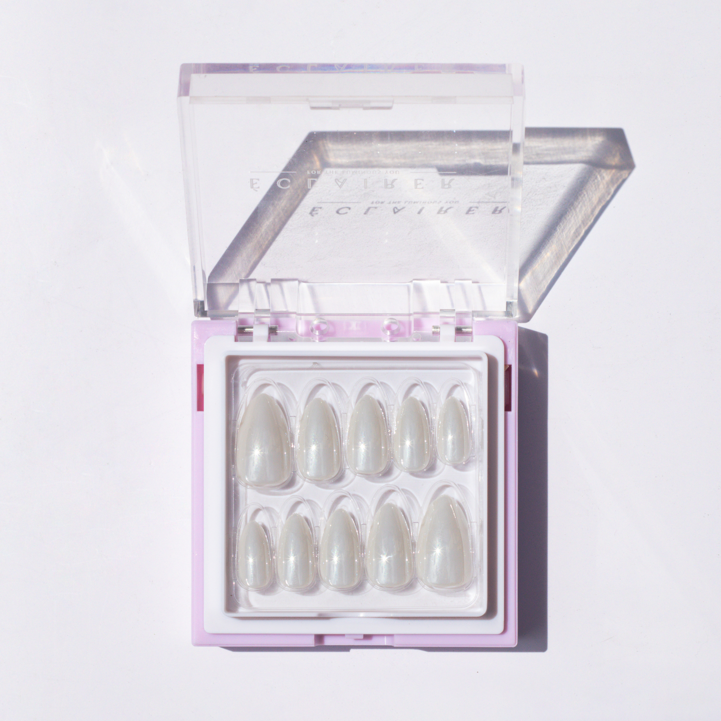 Premium press-on nails with intricate designs for a self-love boost.