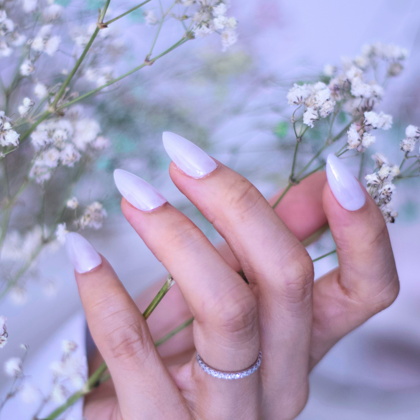 Premium press-on nails with intricate designs for a self-love boost.